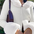 Dámsky pletený sveter s kožušinovým lemom