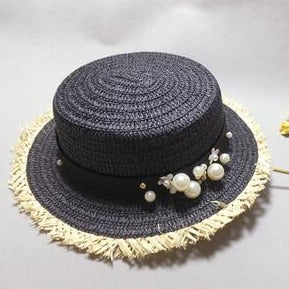 Dámsky slamený klobúk s ozdobou