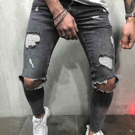 Luxusné pánske džínsy s dierami na kolenách