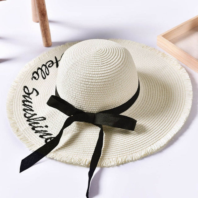 Dámsky slamený klobúk s nápisom