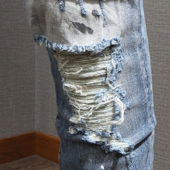 Pánske džínsy svetlomodré maľované roztrhané